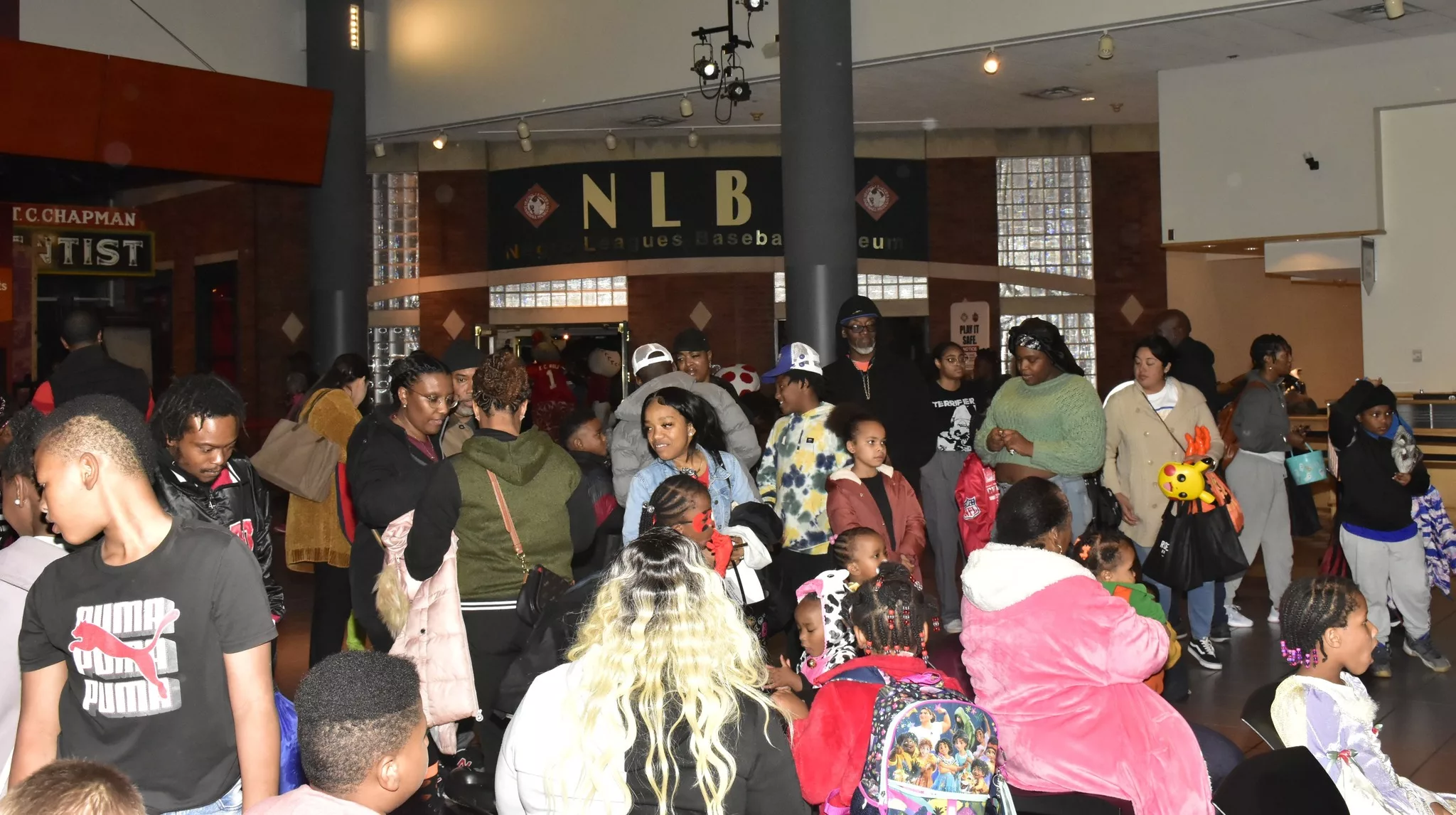A still image of the lobby of the NLBM lobby for the Night of the Harvest Moon children's event