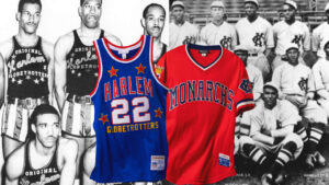 A black and white photo of historical basketball and baseball teams. In front, a modern Harlem Globetrotters jersey and a Kansas City Monarchs jersey are displayed, highlighting their legacy in sports history.