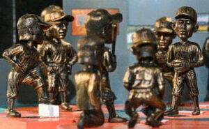 bobble heads standing next to each other. 