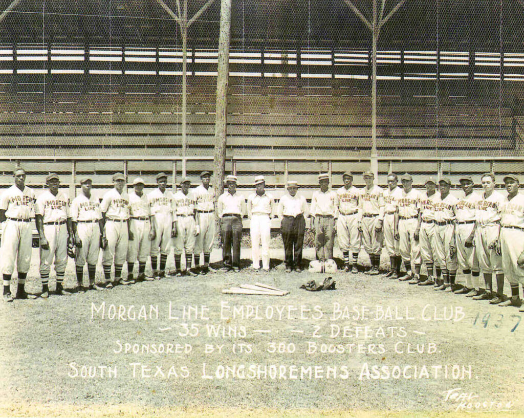 A vintage photo of a baseball team lined up on a field. The teams record, 35 Wins - 2 Defeats, is noted at the bottom along with text indicating they are the Morgan Line Employees Baseball Club, sponsored by the 300 Boosters Club, South Texas Longshoremens Association.