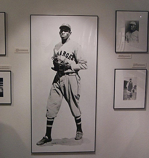 A framed image of an NLB player as a part of the Discover Greatness exhibit