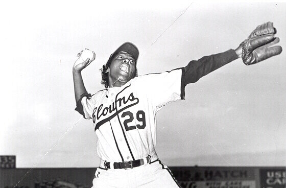 Black and White image of Toni Stone throwing the ball